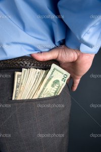 dollar-bills-sticking-out-of-the-pocket-of-a-man.jpg