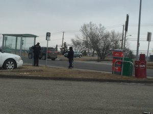 Cop Hiding in Bus Stop within Playground Feb 20 2016.JPG