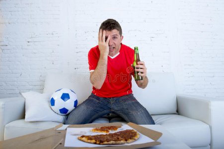 soccer-fan-team-jersey-watching-football-game-tv-nervous-stressed-young-supporter-man-wearing-...jpg